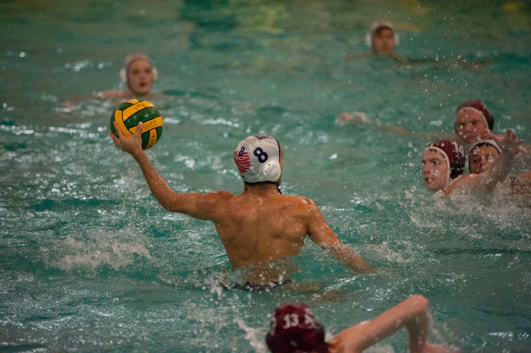 Dawson boys water polo player preparing to pass