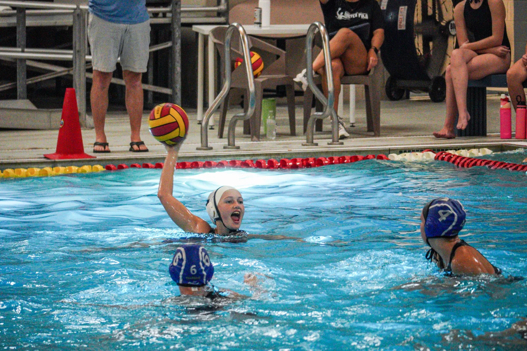 Dawson girls water polo player attacking with the ball