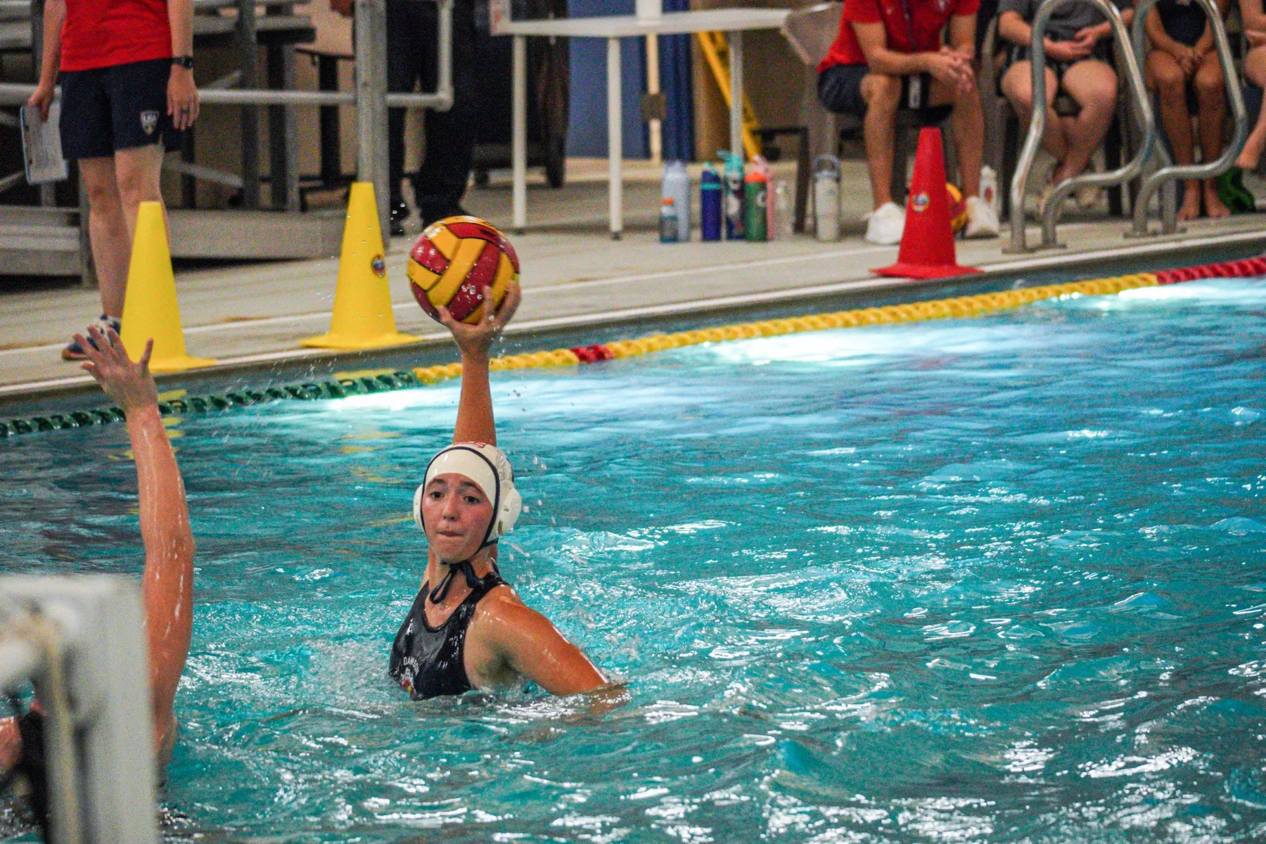 Dawson girls water polo player preparing to shoot